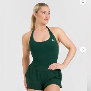TIMELESS HALTER NECK MID VEST
Racing Green Size Medium